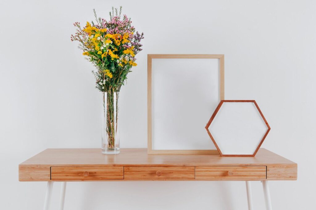 Corner bookshelves framing a desk in a small home office